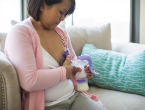 Manual Breast Pump Being Used By Lady